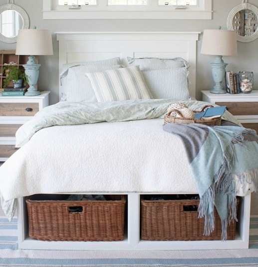 An image of baskets under a bed