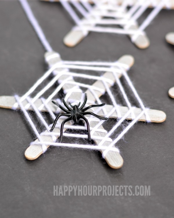 Halloween crafts for kids: Stick spiderwebs
